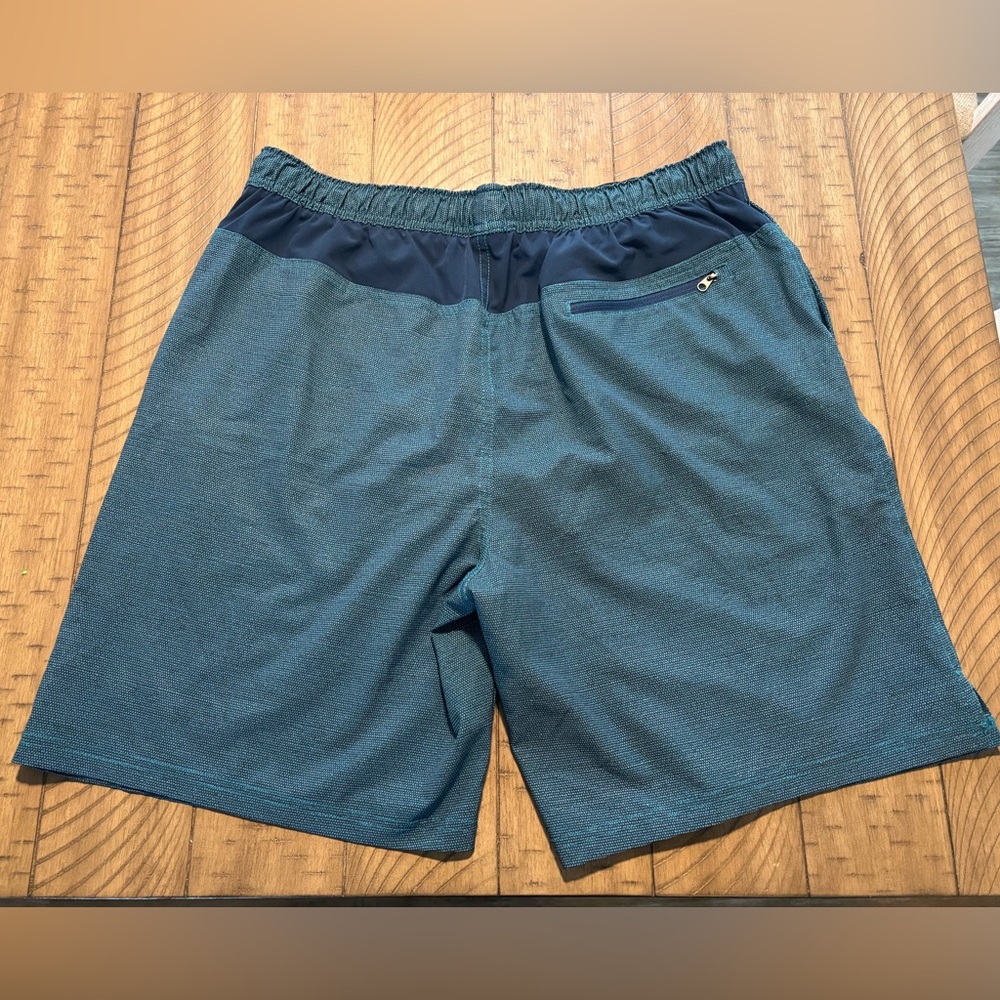 Speedo men’s swim shorts with lining size large teal blue like new tie waist